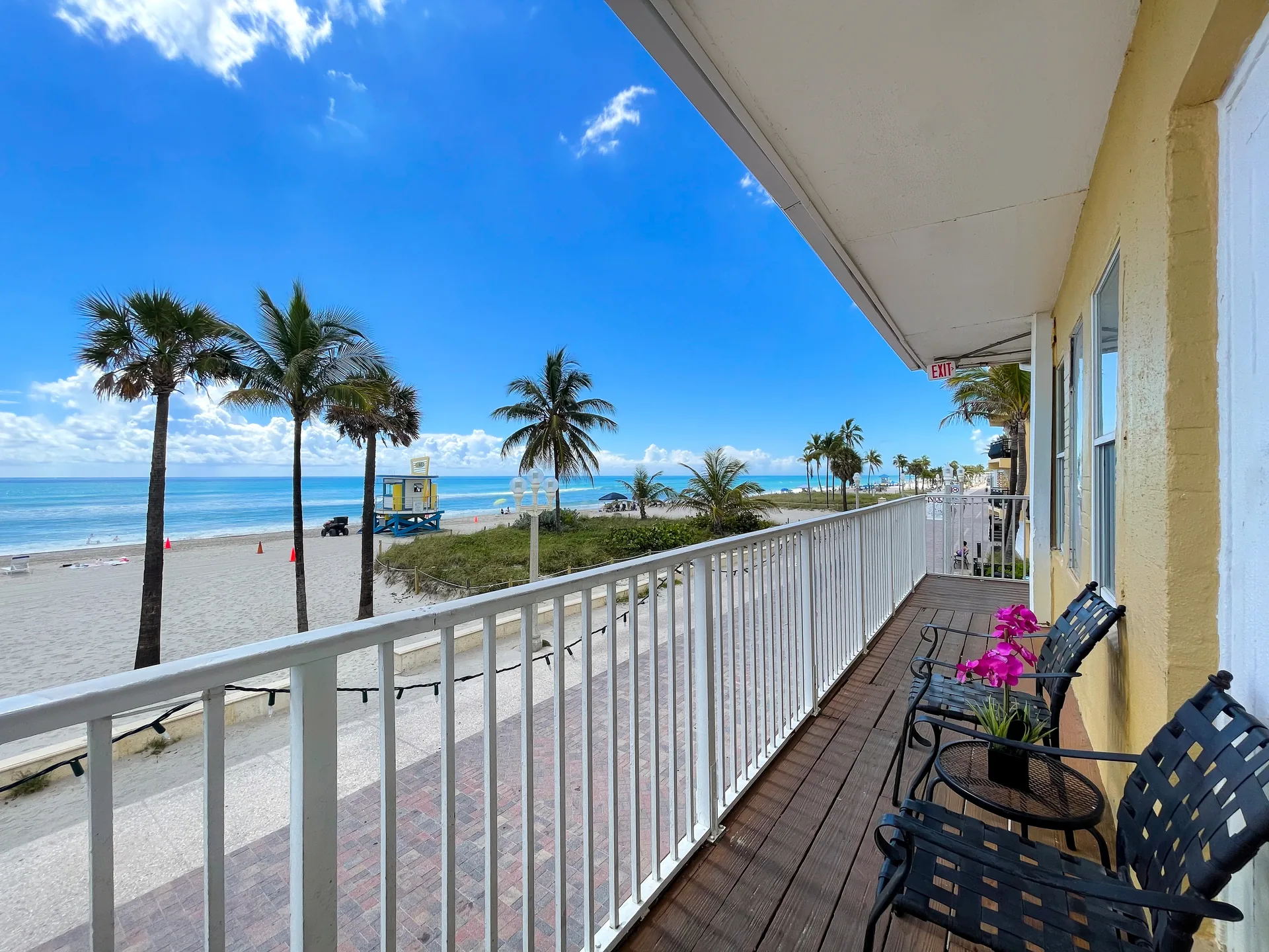 A balcony with a beach view
