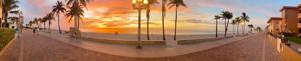 Your ultimate travel destination - Hollywood Beach boardwalk in sunset